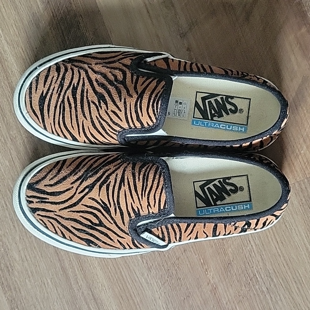 Vans slip-on tiger print sneakers